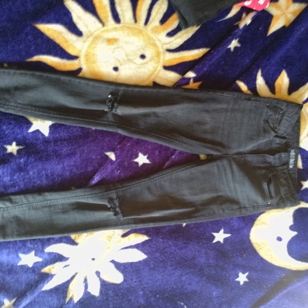 Distressed dark grey skinny jeans